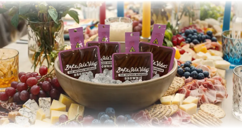 BakeSale Vibes pouches on ice with elegant charcuterie board