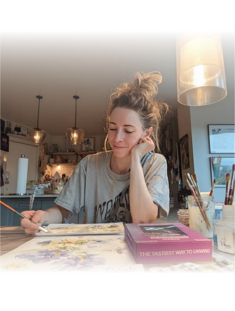 Woman relaxing with art and BakeSale Vibes product